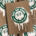 Front cover of Rise and Grind by Lucky's Tattoo Parlor featuring a Starbucks-style logo on a cardboard spiral bound cover.