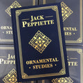 Belzel Books presents Ornamental Studies by Jack Peppiette. Dark blue hard cover with gold writing. 