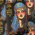 Front cover of Todd Noble - The Look of Love Book Vol. II featuring a full color drawing of a girl's face on a black cover.
