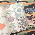 Inside pages of Japanese Patterns featuring patterns with fans, flowers, and more 