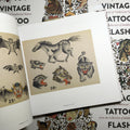 Inside pages of Vintage Tattoo Flash Volume I featuring bat, panther and other flash from Paul Rogers.