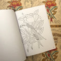 Inside pages of Danny G & RCT - American Traditional Coloring Book featuring outline art of a bird on a rose.
