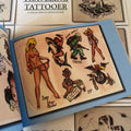 Military and nude girls in  Handbook for the Traveling Tattooer: A Collection of Vintage Flash by Gordon "Wrath" McCloud.