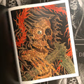 Inside page of Mike Destefano - The Book Of Death displaying a grim reaper whose skeleton has a swisscheese light appearance. The reaper is surrounded by orange flames and holding a scythe that also has a very swiss cheese like texture.