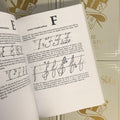 Inside pages of Dave Gibson - The Lettering Book featuring letter construction and detailing for the letter 'F'.